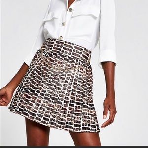 ASOS pleated skirt with front chain